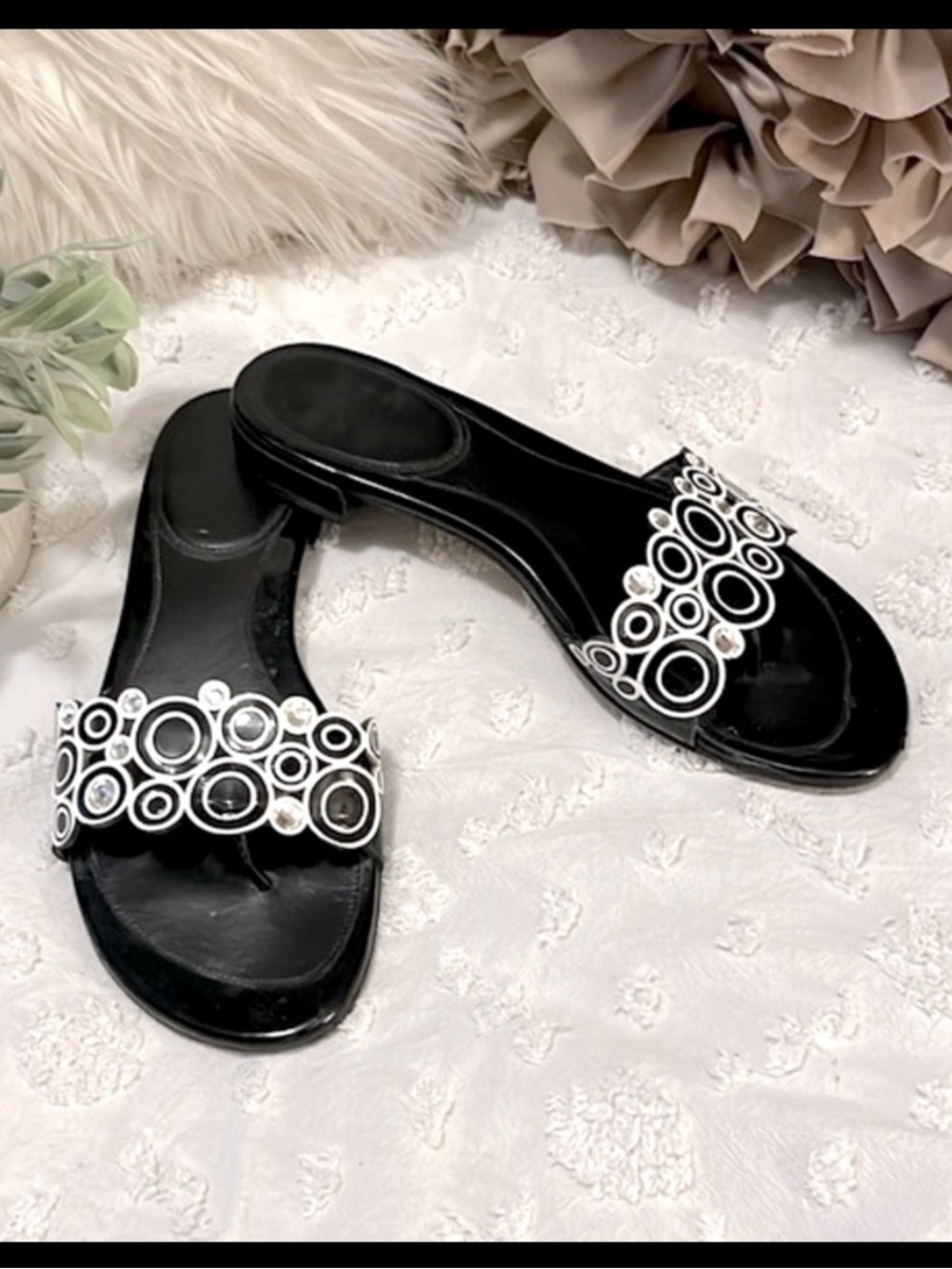 Stuart Weitzman Black Slide Sandals with Silver Circle Embellishments
